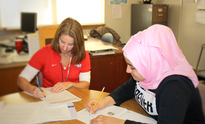 Maryam starts her day with an English language assessment.